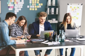 Office workers collaborating