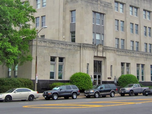 Courthouse Landscaping Overgrown Shrubs