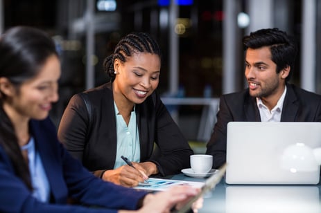 Businessman interacting with a colleague in the office