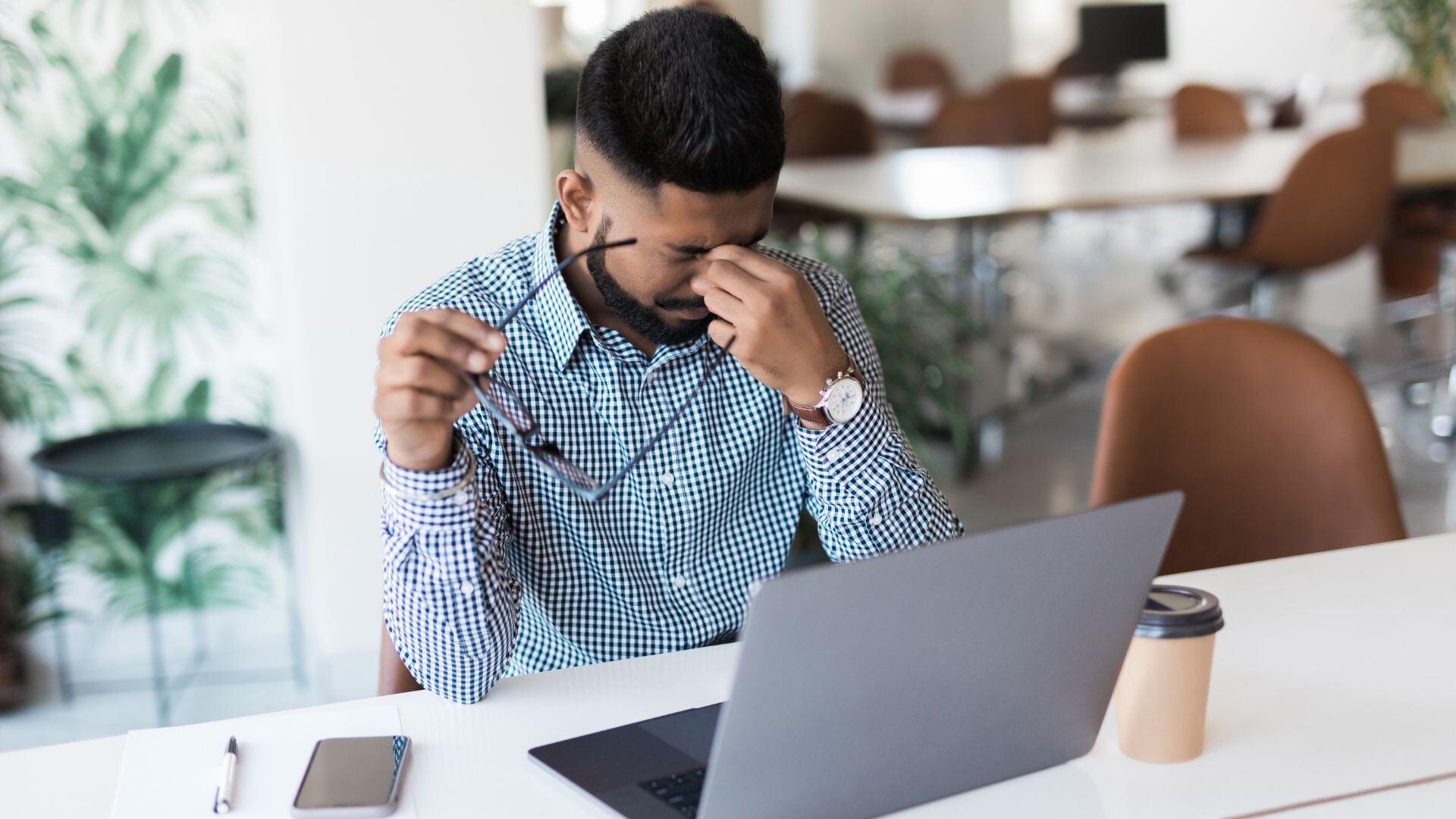 frustrated worker as work from home regulations tighten